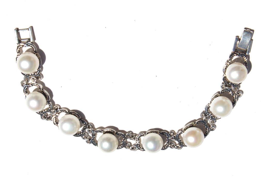 Perlas naturales en pulsera I